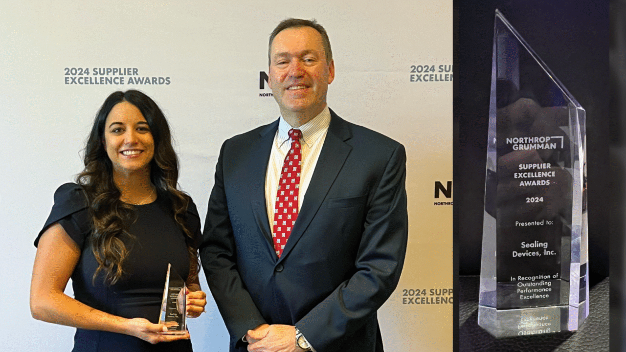 Melissa Lisciandro and Scott Walrath accept the Supplier Excellence Award from Northrop Grumman